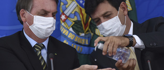Bolsonaro sparkar minister efter coronatvist