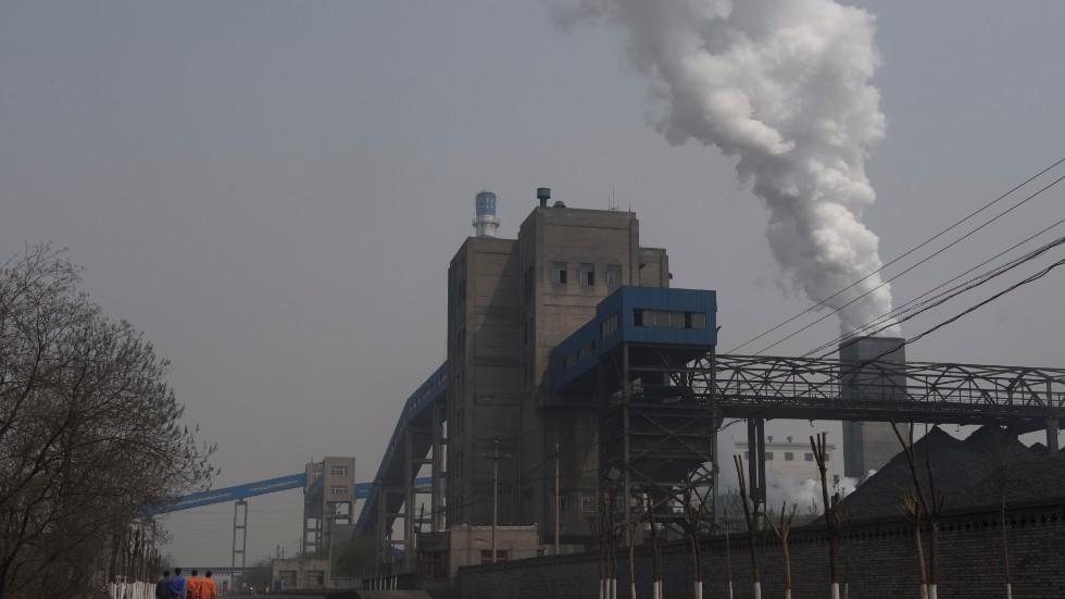 En bild av Kina och kolkraft. Gammalt, slitet och stora mängder billig energi. Det finns andra bilder av mer modern kraftproduktion i Kina. Men kolet är där det är. 