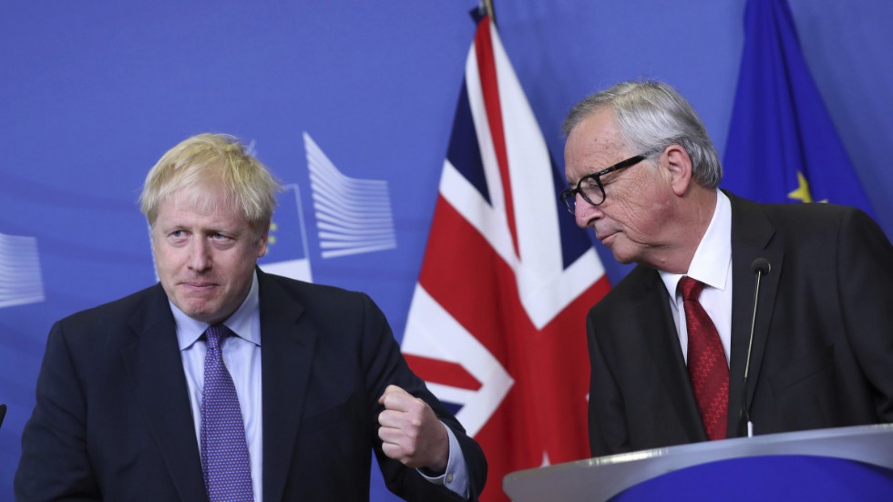 Storbritanniens premiärminister Boris Johnson och EU:s avgående kommissionsordförande Jean-Claude Juncker.