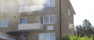 Brand på Brandgatan – räddades av vaktmästaren: "Brann uppför väggen"