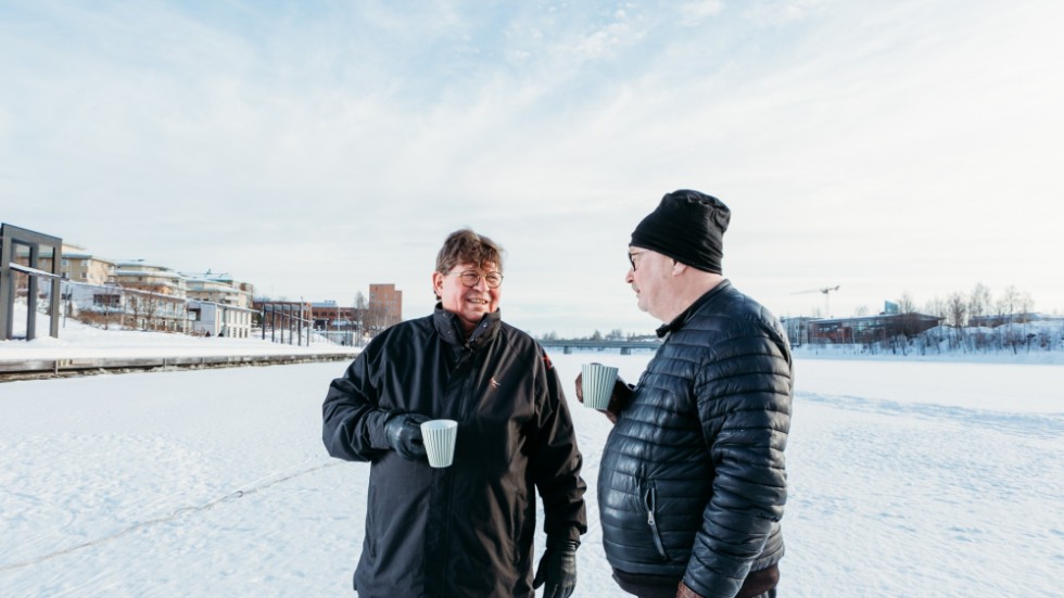 Dark & Cold Winter Swim founders, Jarkko Enqvist (left) and Lasse Westerlund (right) on the ice before the Winter Swim event in Skellefteå, 2023.