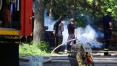 Brand nära begravningsplats hotade att sprida sig