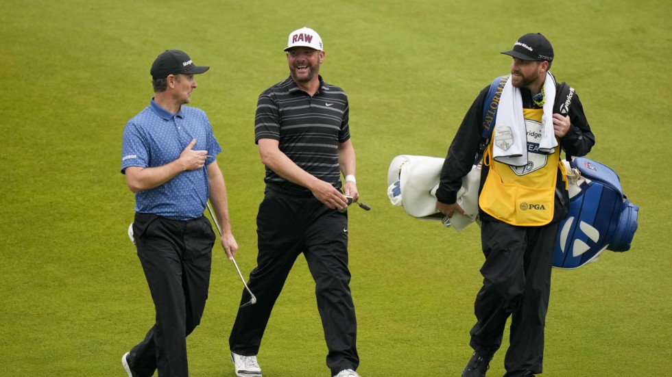 Michael Block ser till att njuta tillsammans med världsstjärnan Justin Rose (t.v.).