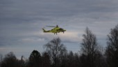 Skadad kvinna hämtades med helikopter