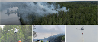 Helikoptrar vattenbombade skogsbrand utanför Norrköping