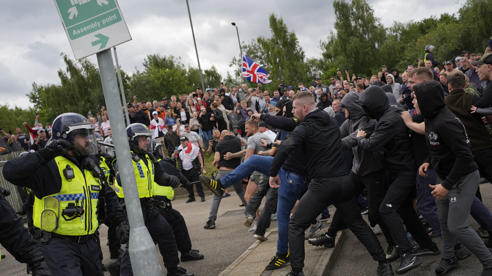 Trouble flares during a far-right riot outside the Holiday Inn Express in Rotherham, England.