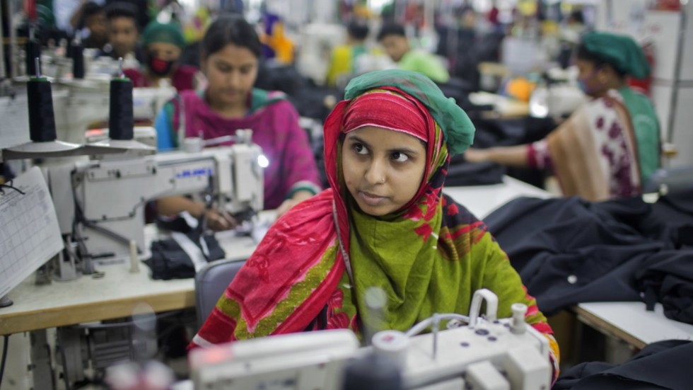 Textilarbetare i Bangladesh.Arkivbild.