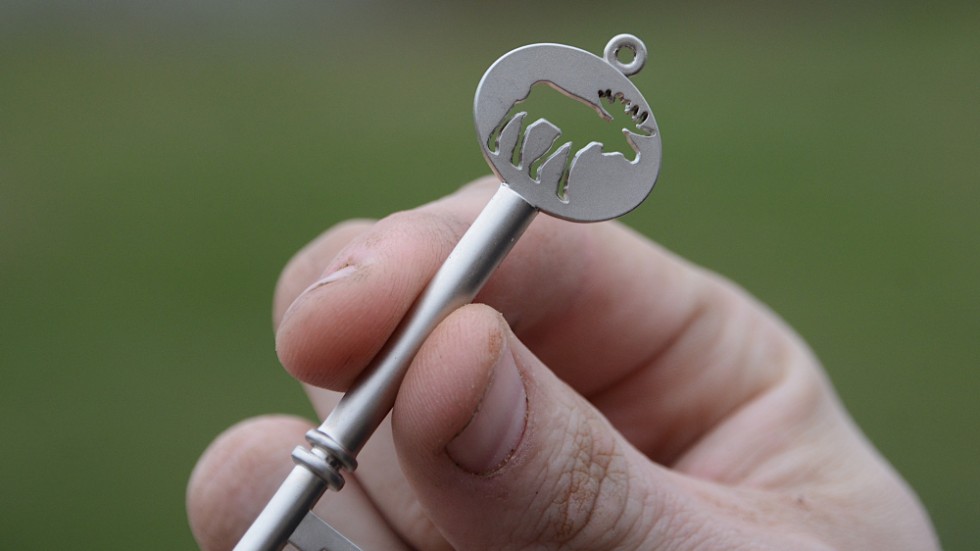 En nyckel med en älgsymbol visar att älgparken nu är i nya händer. 