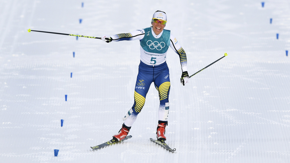 Charlotte Kalla jublar efter ha tagit OS-guldet i skiathlon 2018. Arkivbild.