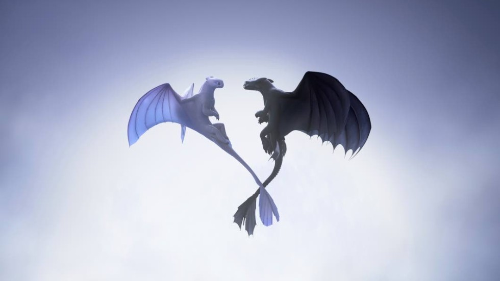 This image released by Universal Pictures shows characters, female Light Fury dragon, left, and Night Fury dragon Toothless, in a scene from DreamWorks Animation's "How to Train Your Dragon: The Hidden World." (DreamWorks Animation/Universal Pictures via AP)