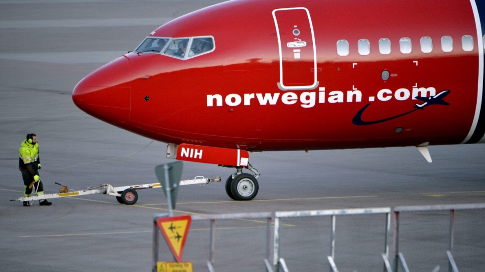 Det norska lågprisflygbolaget Norwegian, med sex av 140 flygplan i trafik i coronapandemin, har varnat för att kassan är tom i början av 2021 om det inte kommer in mer kapital eller nödlån. Arkivbild