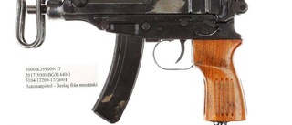 Hotade vakter med kulsprutepistol