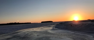 Olle Hägglunds foto av Mjöfjärdens sol och måne        