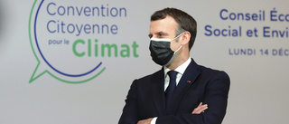 Macron vill ha klimatklausul i grundlagen