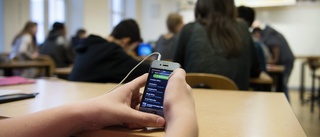 Omplacera mobbare och förbjud mobiler i klassrum