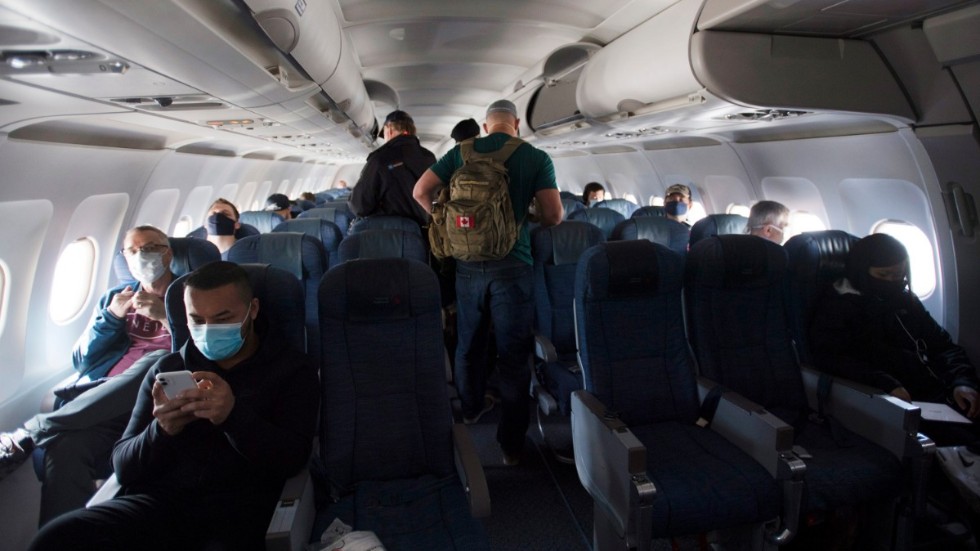 Ansiktsmasker är inte längre obligatoriska på flygningar i USA. Arkivbild.