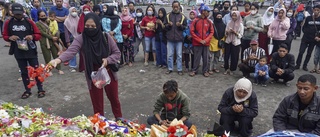 Sex åtalas efter läktartragedin i Indonesien