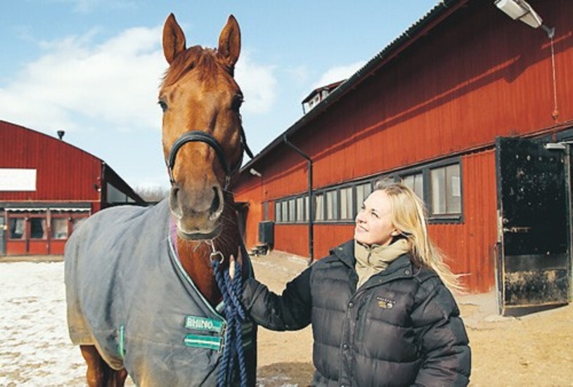 Lisa Svensson tillsammans med hästen Noisette.