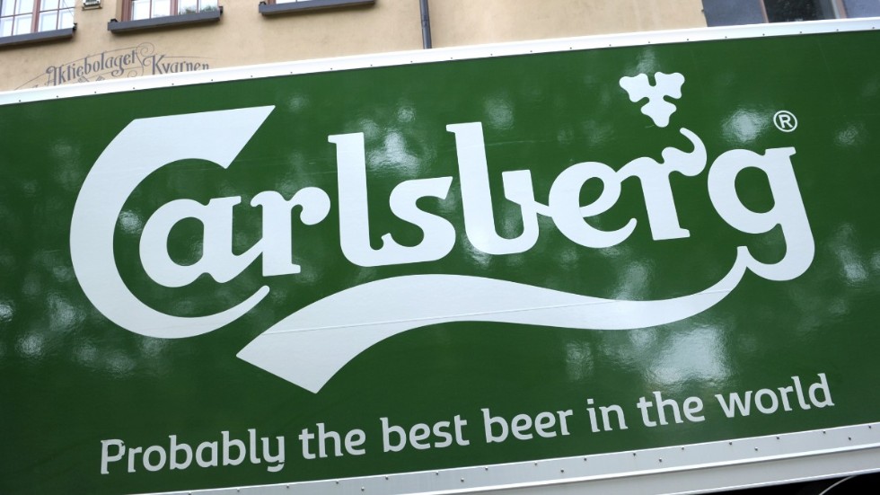 Reklam för öl från Carlsberg. Arkivbild.