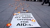 Tända ljus på aidsdagen
