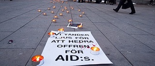 Tända ljus på aidsdagen