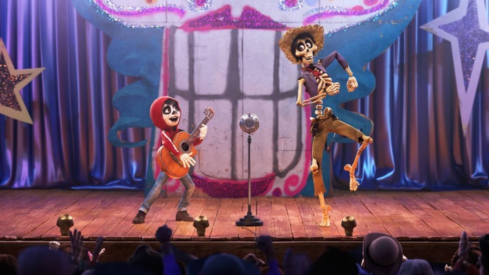 COCO (Pictured) - UN POCO LOCO  In DisneyPixars Coco, aspiring musician Miguel (voice of Anthony Gonzalez) teams up with a charming trickster named Héctor (voice of Gael García Bernal) to unravel a generations-old family mystery. Their extraordinary journey through the Land of the Dead includes an unexpected talent show performance of Un Poco Loco, an original song in the son jarocho style of Mexican music written by co-director Adrian Molina and Germaine Franco for the film. Coco opens in U.S. theaters on Nov. 22, 2017. ©2017 DisneyPixar. All Rights Reserved.
