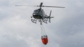 Brandhelikopter skickas till översvämningar