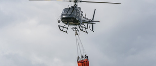 Brandhelikopter skickas till översvämningar