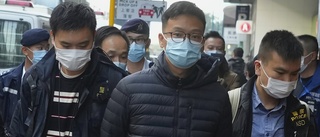 Två misstänkta efter tidningsrazzia i Hongkong
