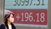 Tokyobörsen gläds åt skuldtaksuppgörelse