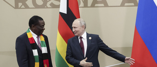 Putin förärar Zimbabwekollega helikopter