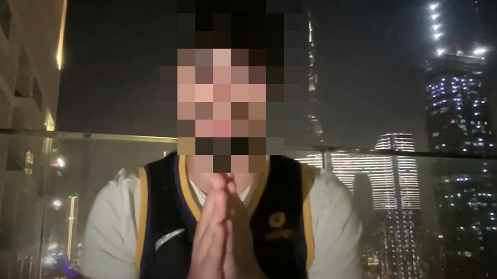The man in the video claims that he is in Dubai and that he can travel anywhere thanks to his earnings from IM Academy.