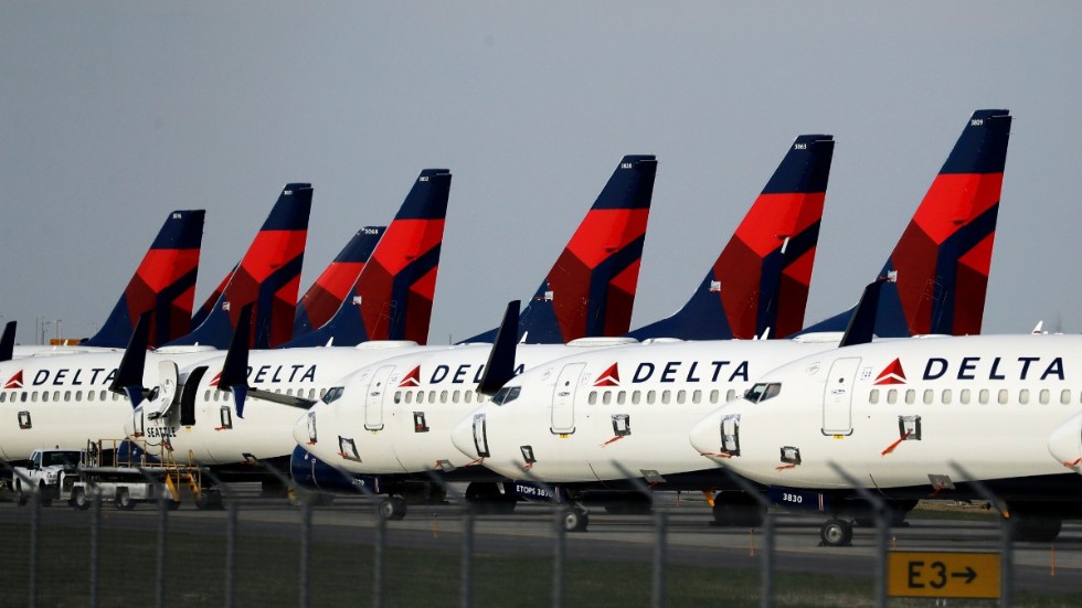 Tusentals anställda sjukskrivna och inställda flygningar slog hårt mot Delta Air Lines under avslutningen av 2021. Arkivbild