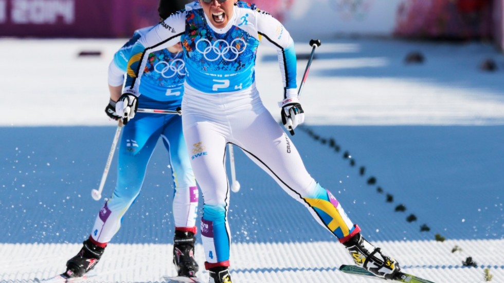 Charlotte Kalla säkrar det svenska OS-guldet i stafett 2014 efter en monstersträcka. Arkivbild.