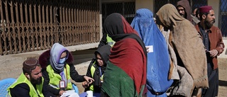 Afghanska kvinnor måste täcka sig för jobb