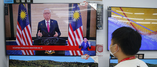 Malaysias nya ledare vill enas mot covid