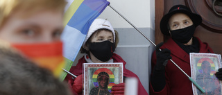 Frias för Madonnabild med regnbågsgloria