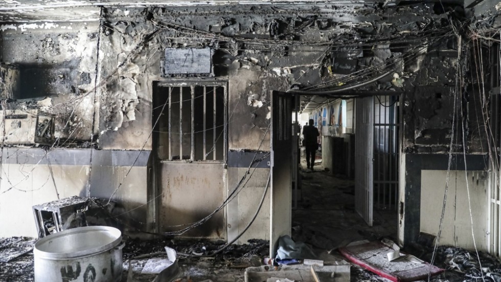 Det branddrabbade fängelset. Fotot är distribuerat av den regimtrogna nyhetsbyrån Mizan.