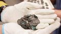 Tusen år gamla silvermynt hittade i grav
