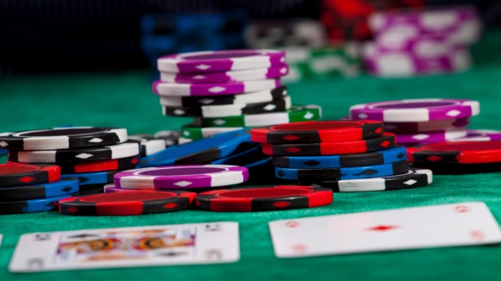 Poker chips and cards in a Texas hold 'em game.