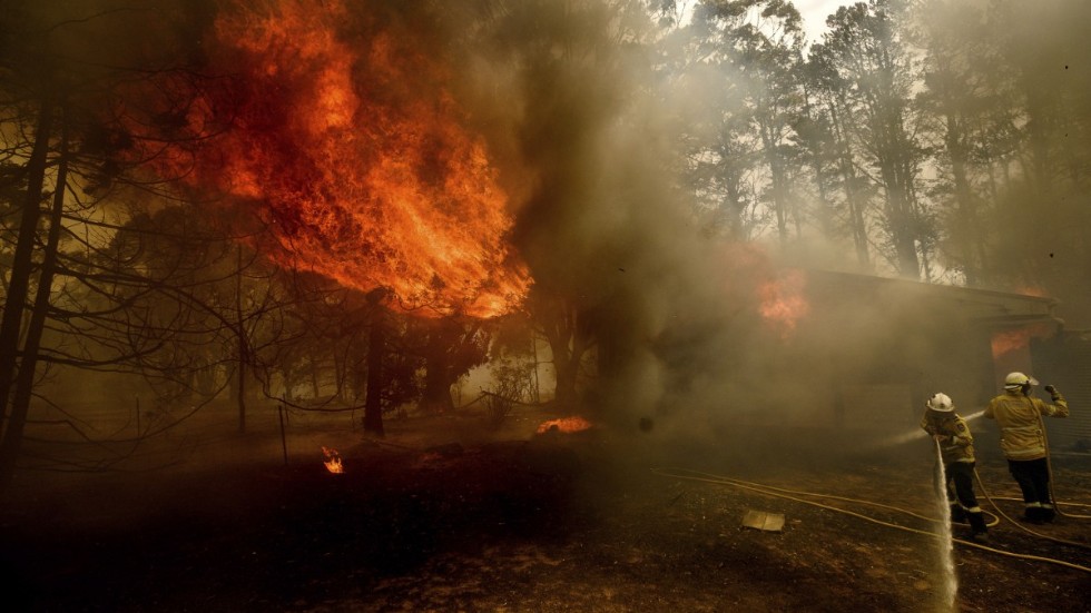 Brandmän under bekämpningen av en brand nära Bundanoon i New South Wales i januari.