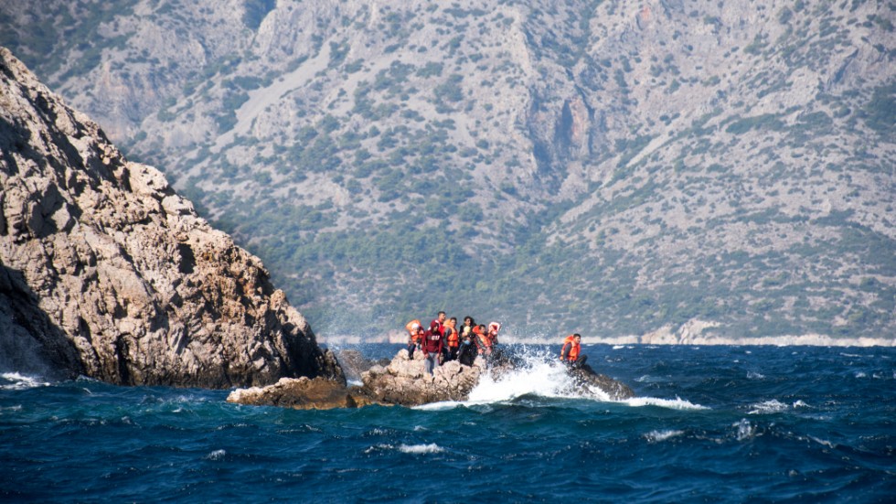 Asylsökande på en klippa i Grekland 2015.